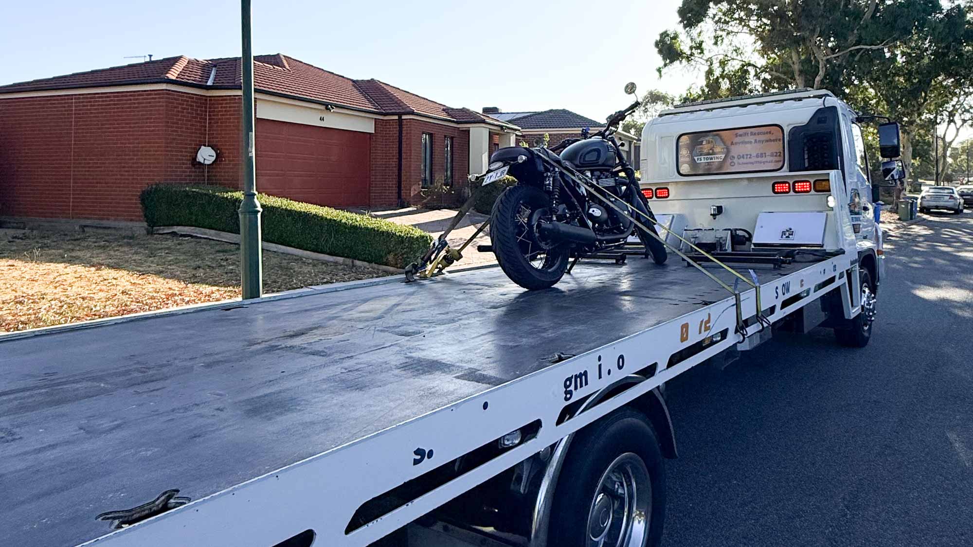 motorcycle on a tow truck