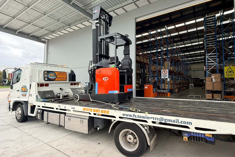 Forklift loaded onto tilt tray truck Melbourne